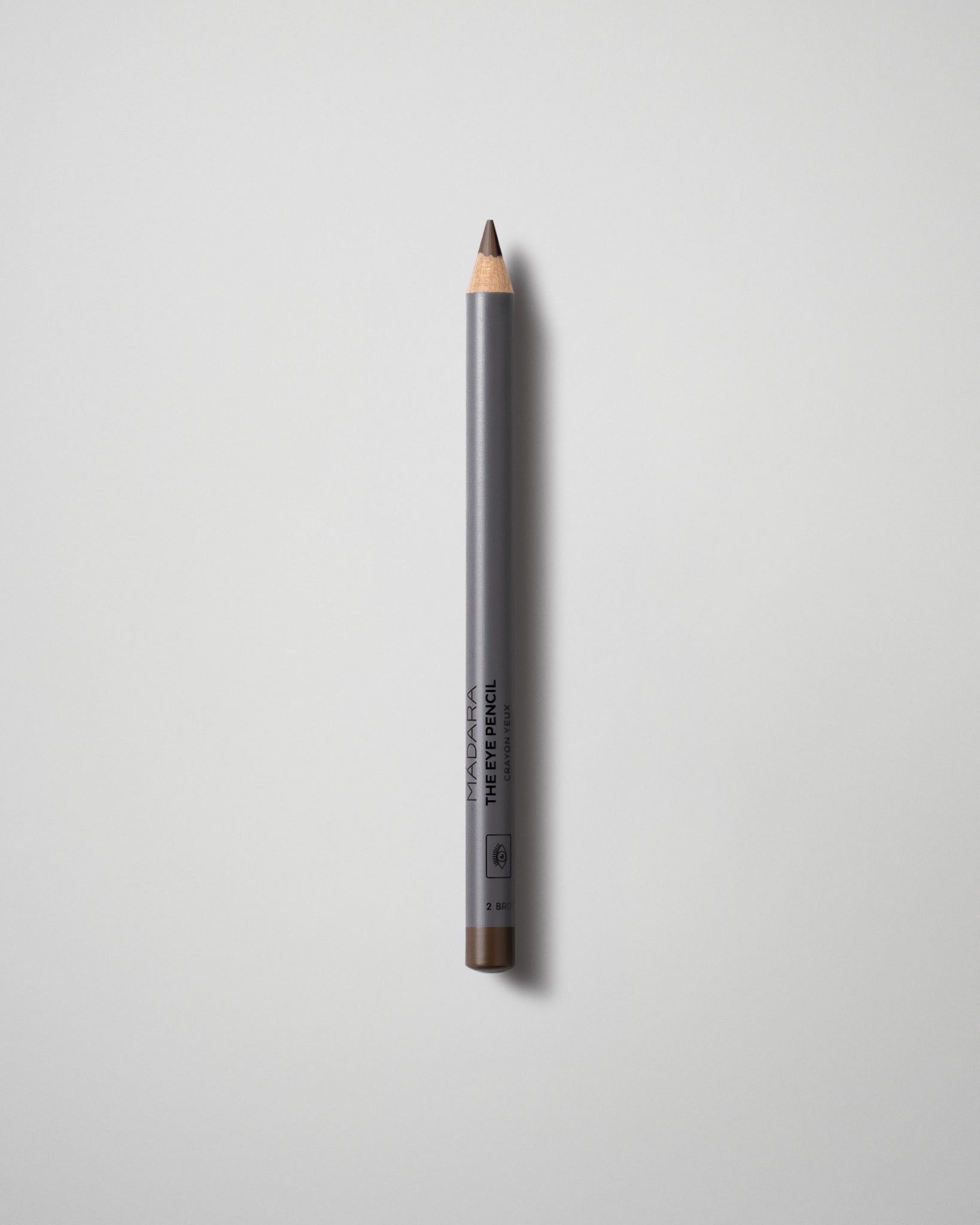 MÁDARA Organic Skincare the eye pencil brown A6882 eye contour care product photo on plain background.