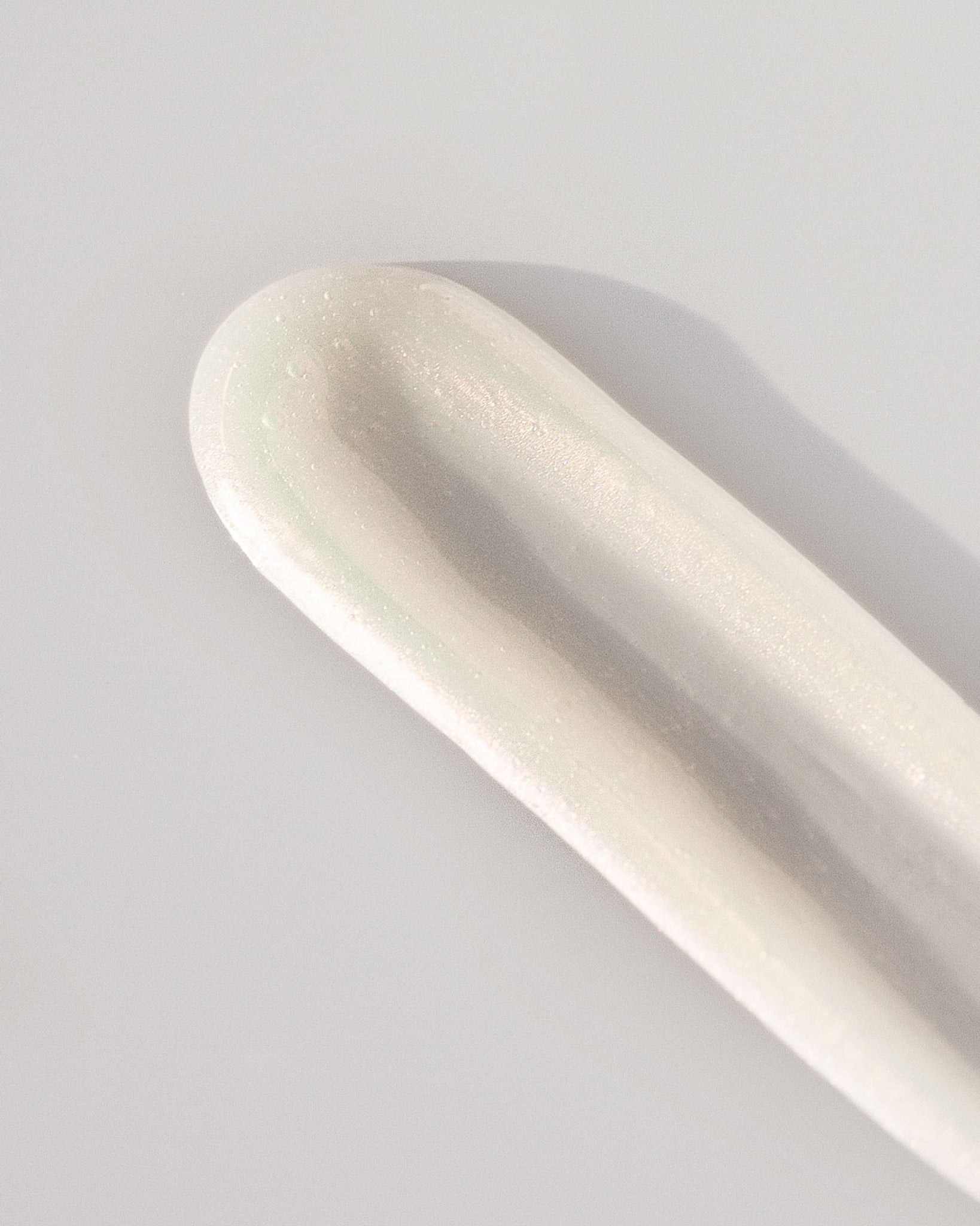 Texture close-up of MÁDARA Organic Skincare skincare remover A2003 �swatch demonstrates consistency and finish.