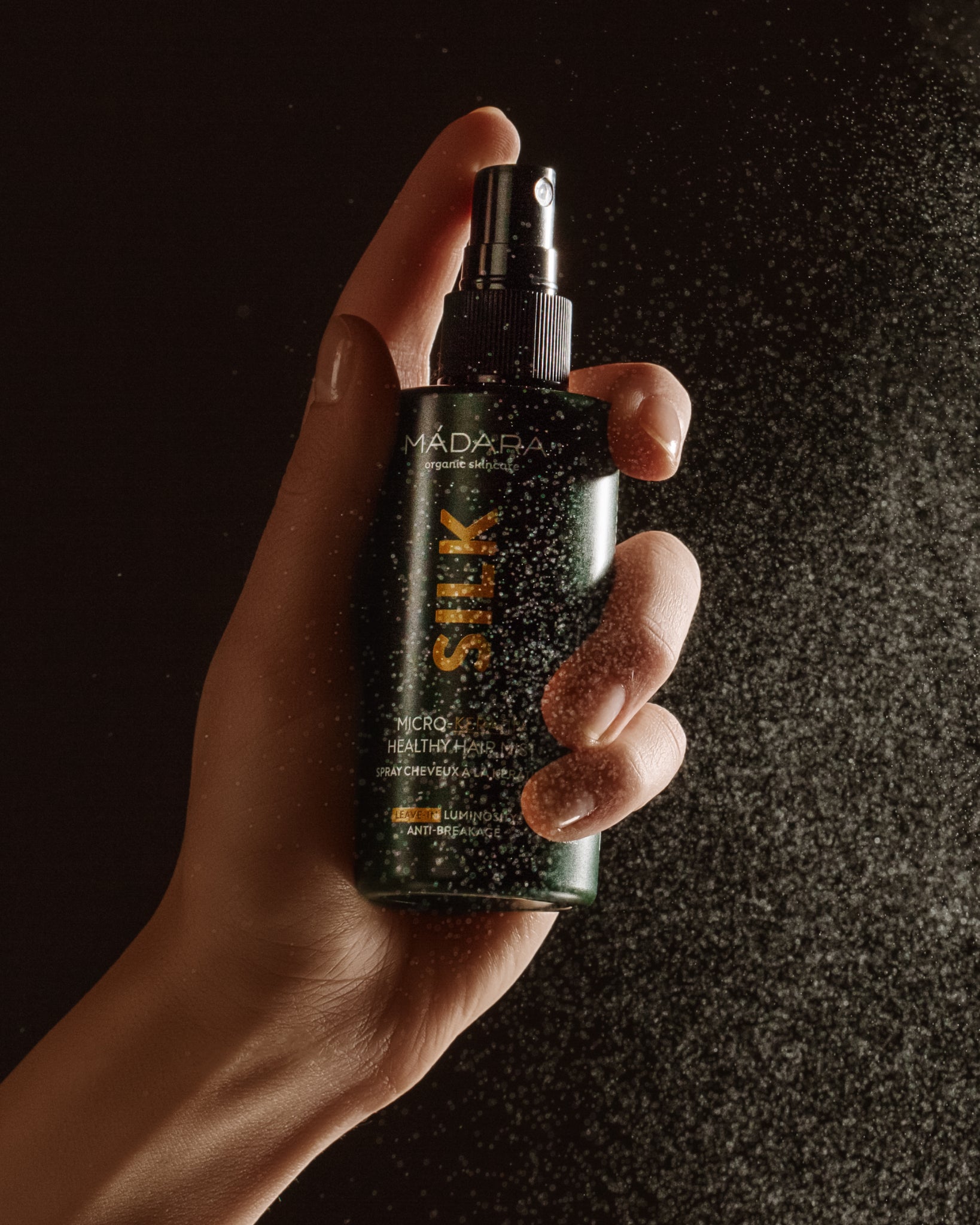 MÁDARA Organic Skincare hydrolized keratin hair mist A4061 face mist product photo on plain background.