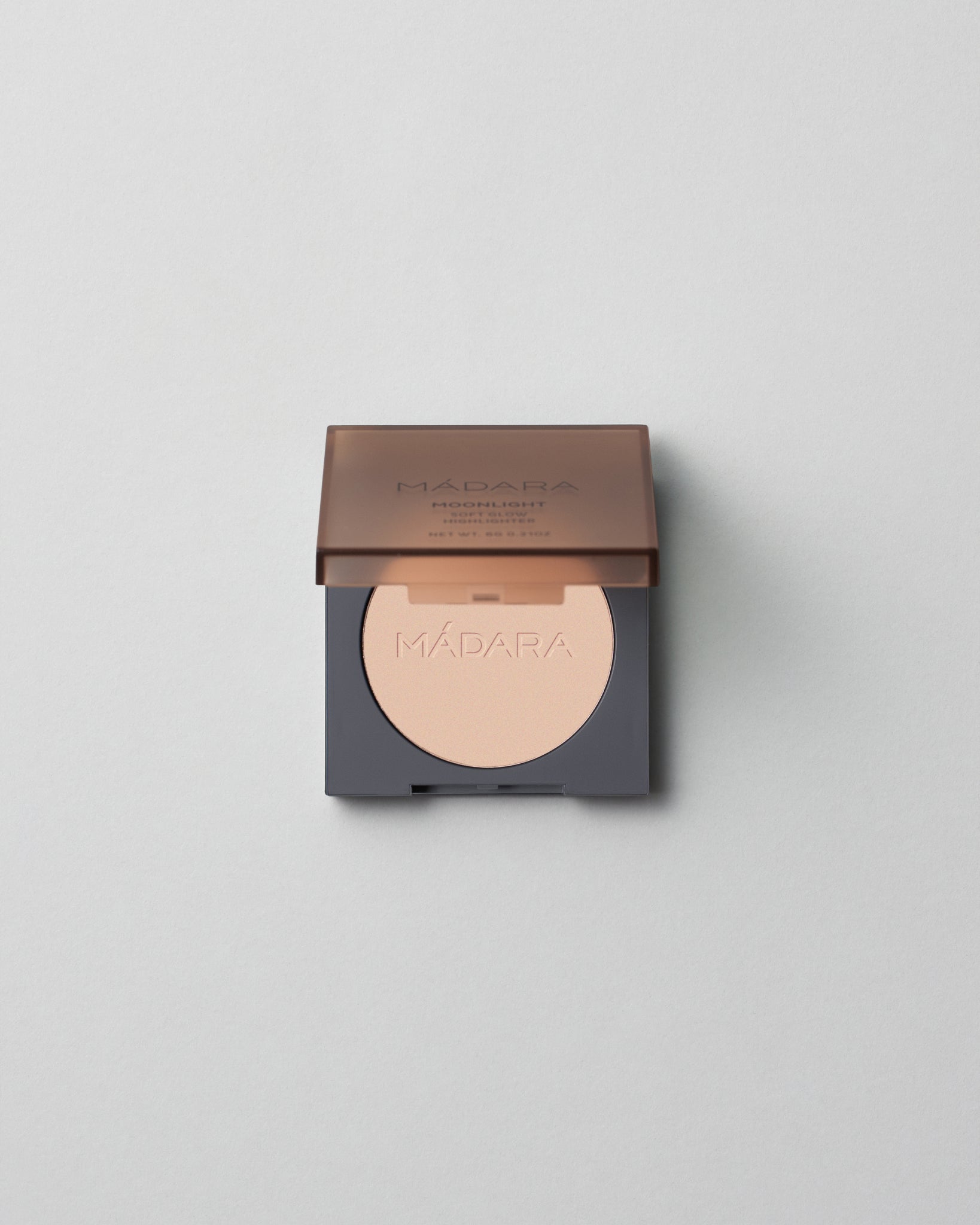 MÁDARA Organic Skincare moonlight soft glow mineral highlighter A6831 product photo on plain background.