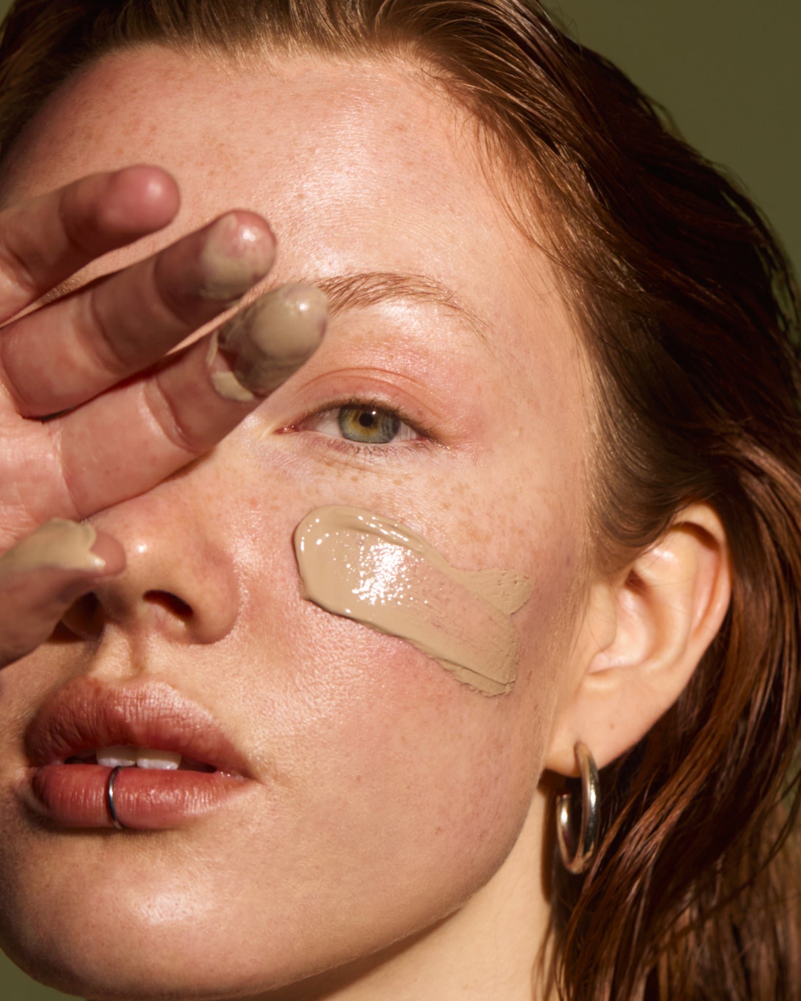 MÁDARA Organic Skincare tinted spf50 sunscreen A3416 mineral sunscreen product photo on plain background.