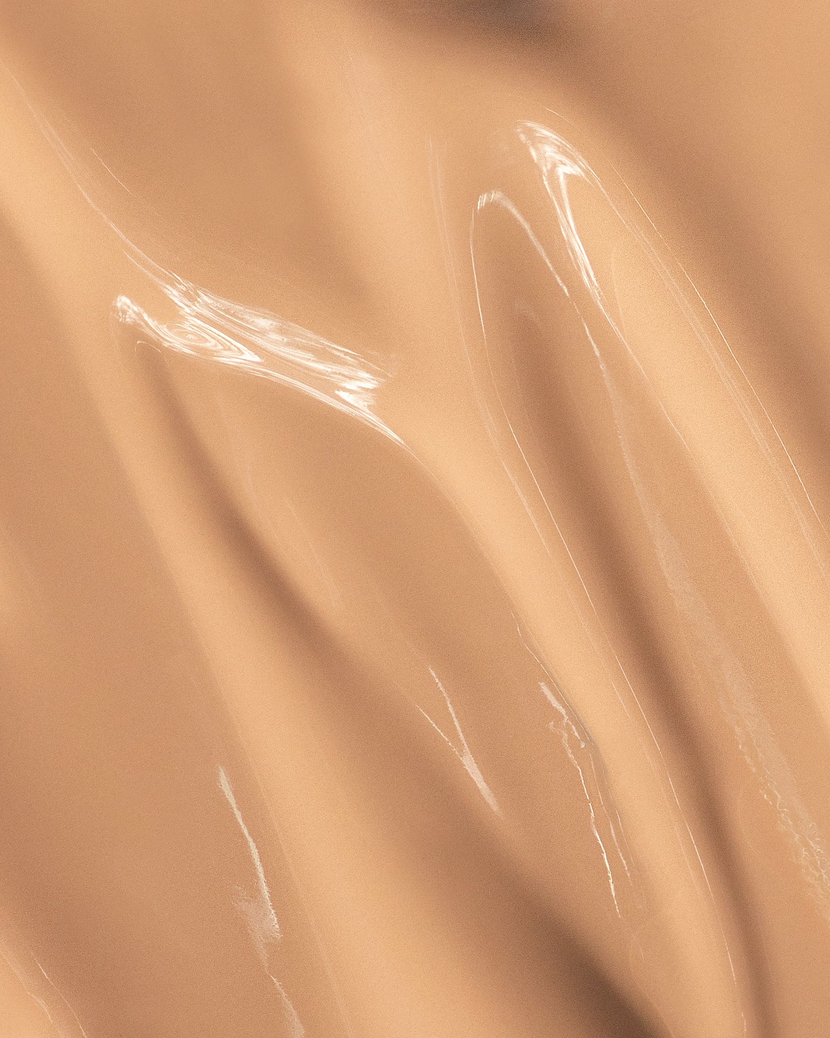 Texture close-up of MÁDARA Organic Skincare skin equal sand A6057 �swatch demonstrates consistency and finish.