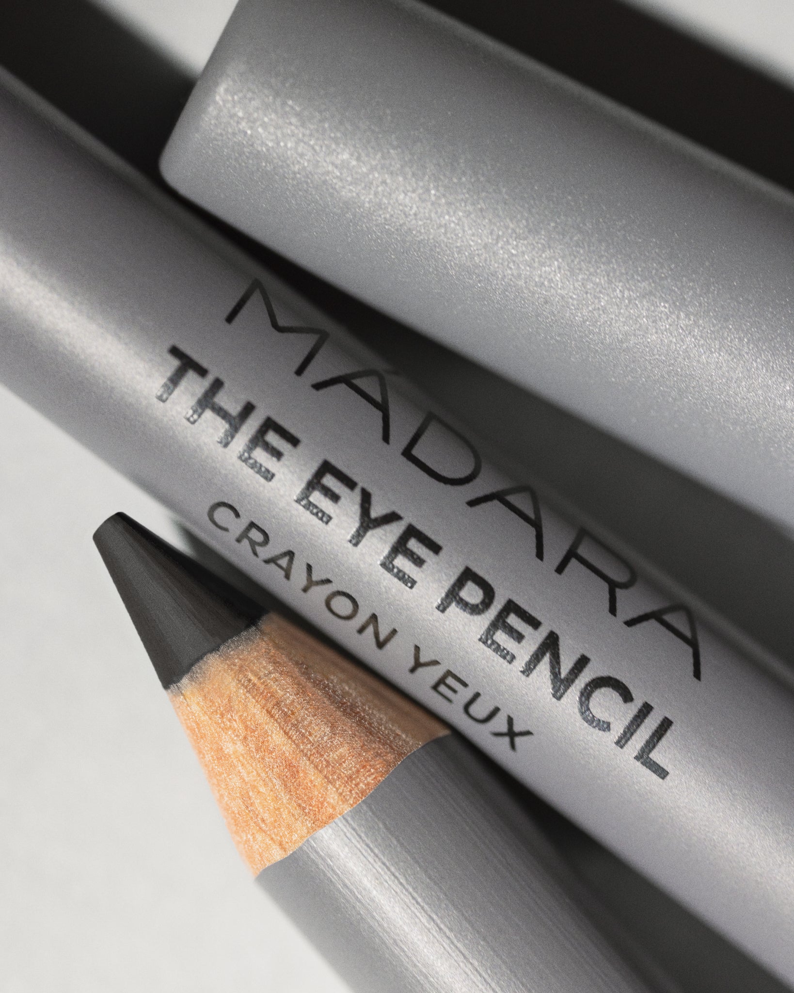 MÁDARA Organic Skincare black eye pencil madara A6881 eye contour care product photo on plain background.
