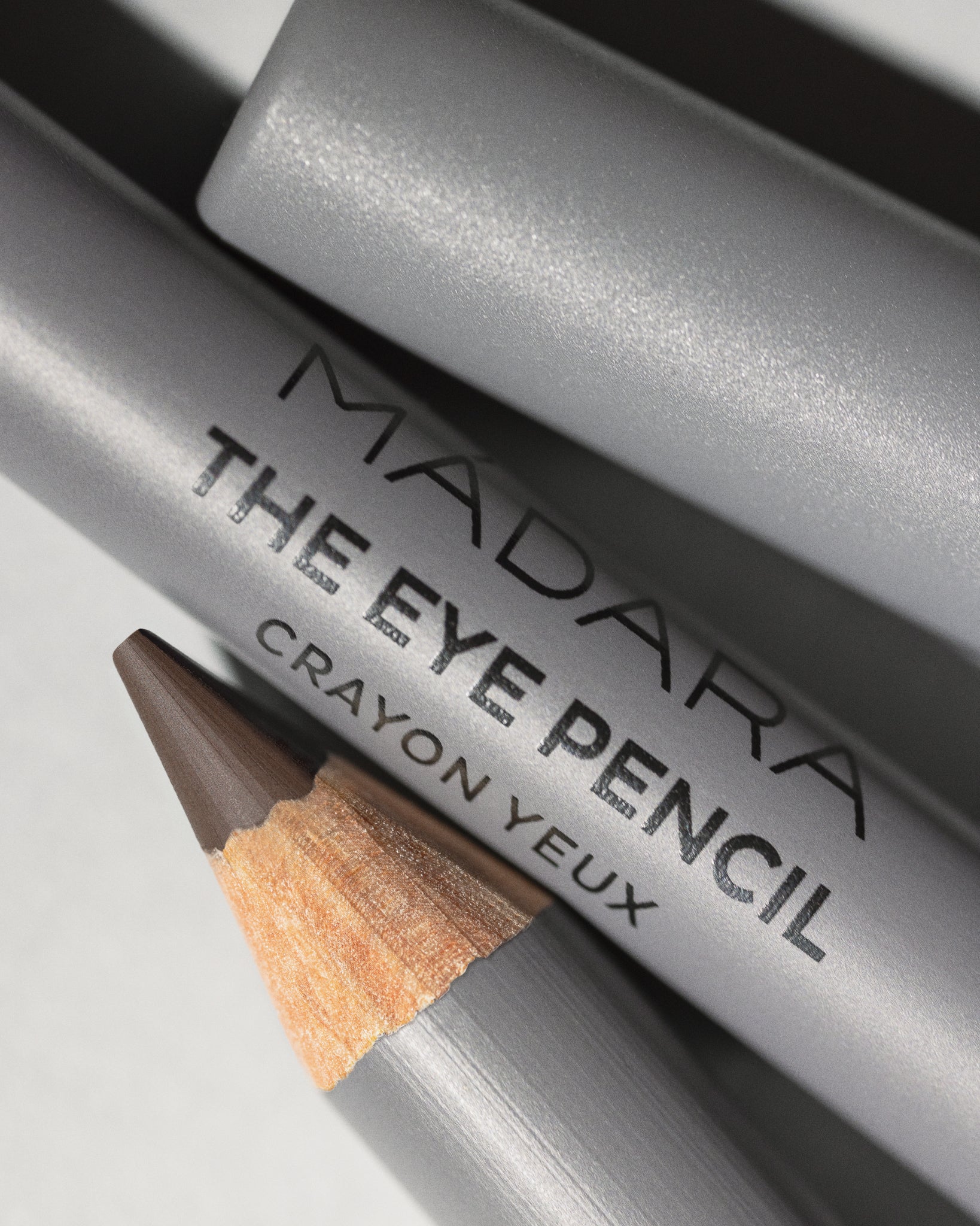 MÁDARA Organic Skincare brown eye pencil madara A6882 eye contour care product photo on plain background.