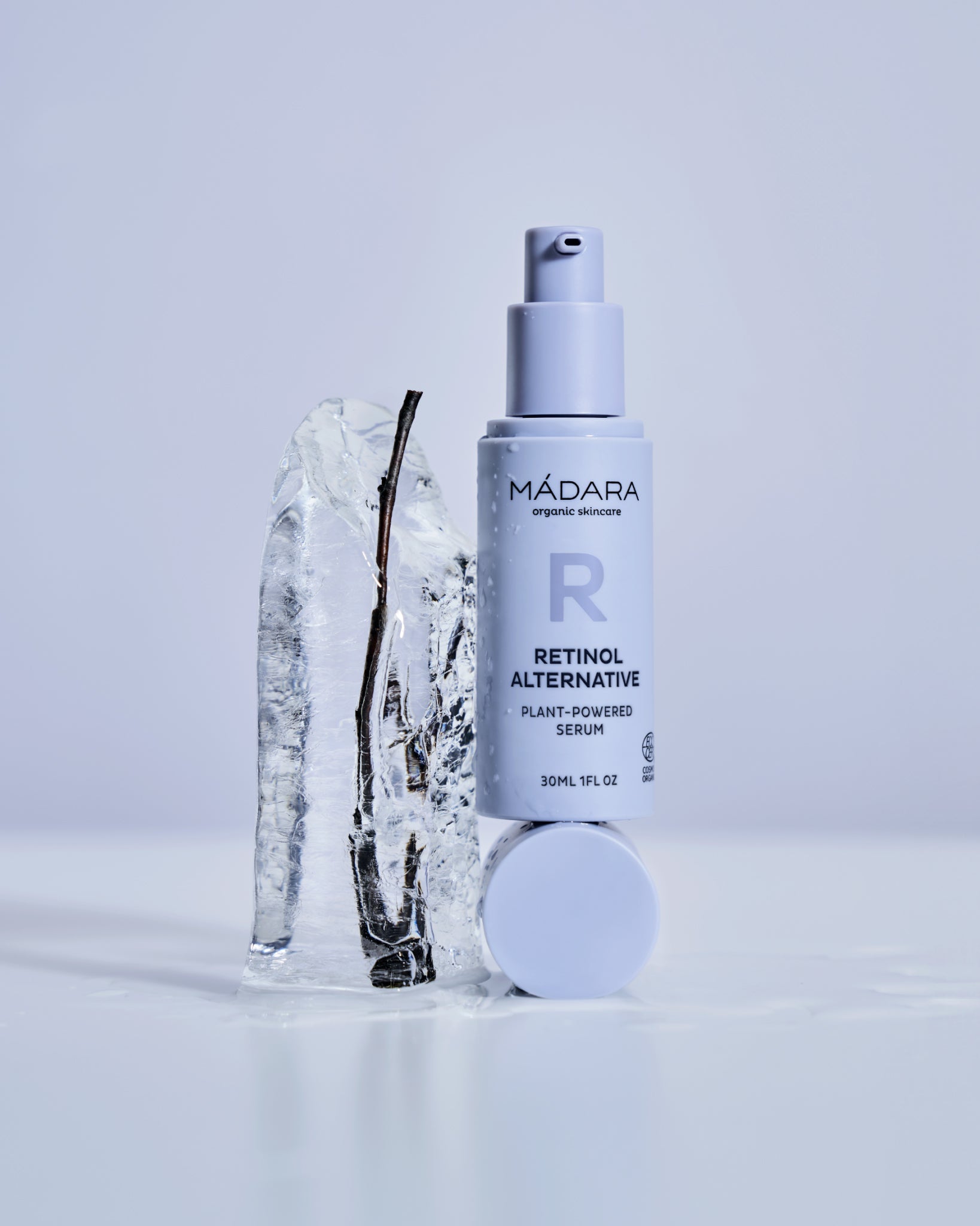 MÁDARA Organic Skincare organic plant powered serum A3185 serum product photo on plain background.